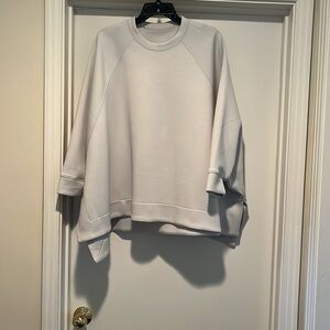 Cogthebigsmoke  sweatshirt with deep slits at hem and distinctive side view